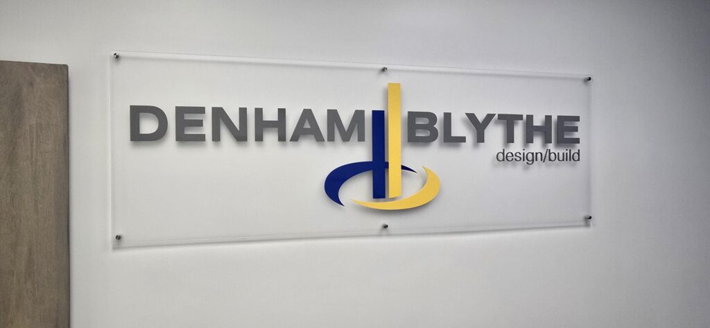 Acrylic lobby logo with standoff hardware 1